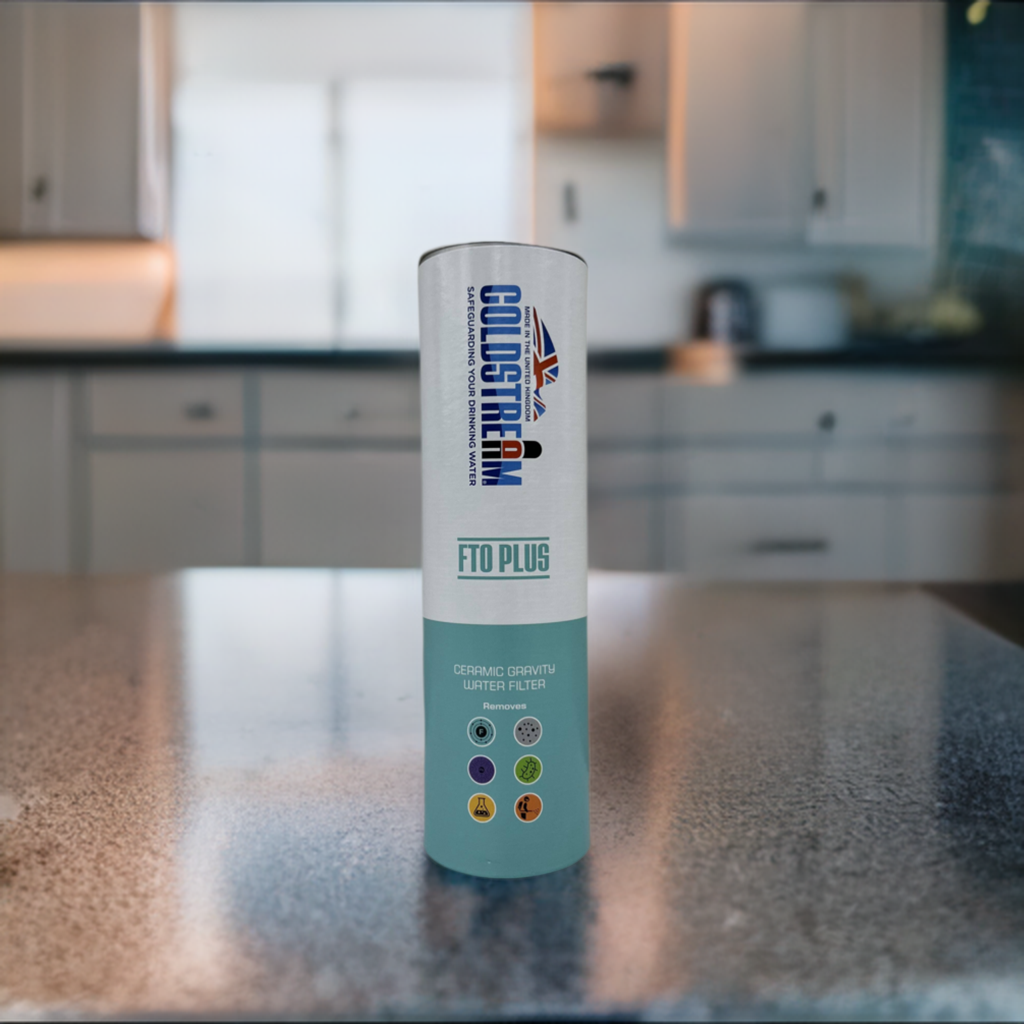 53475554137_db69503ec3_o - Business Connect World RSA - Staging Ceramic gravity water filter bottle on a kitchen counter labeled FTO PLUS with feature icons.